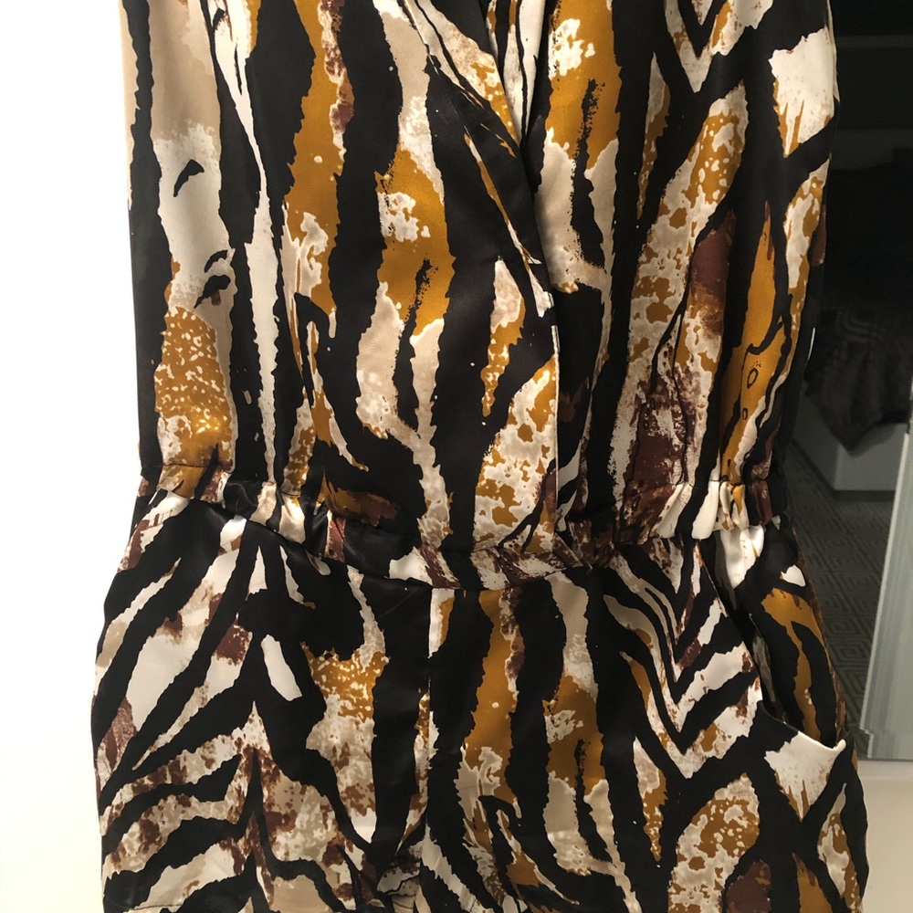Animal print romper by Grass Collection